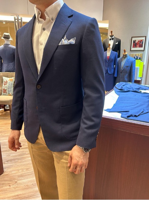 blue travel suit with pocket square modern look