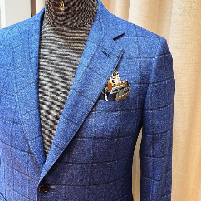 elegant blue checkered travel suit jacket