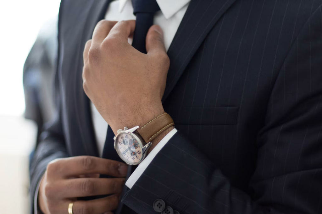 fixing the tie on a suit